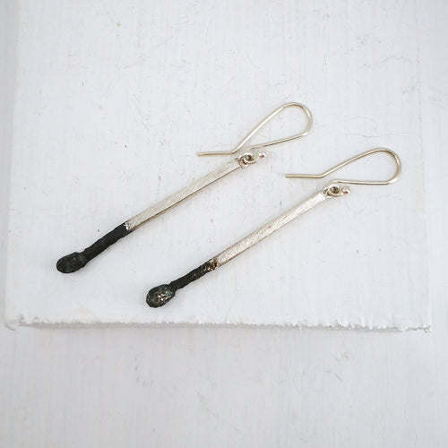 The Burnt Match Stick Earrings in solid silver by David McLeod.