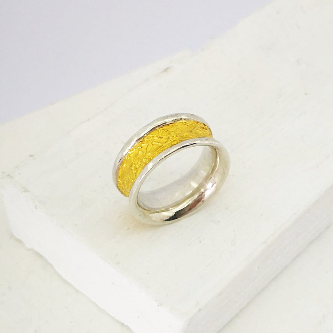 The medium Text-ure ring in 22ct gold and sterling silver. Handmade NZ jewellery by David McLeod.