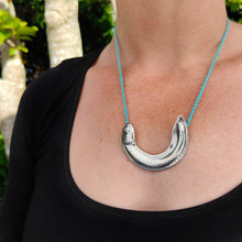 Load image into Gallery viewer, The silver Inanga  or Whitebait pendant from Vaune Mason is handcrafted in solid sterling silver and strung on a hand plaited nylon cord. Quality NZ jewellery at Mason &amp; Collins.
