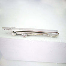 Load image into Gallery viewer, The Tuatara Tie Slide is hand crafted in sterling silver by The Wild Jewellery NZ.
