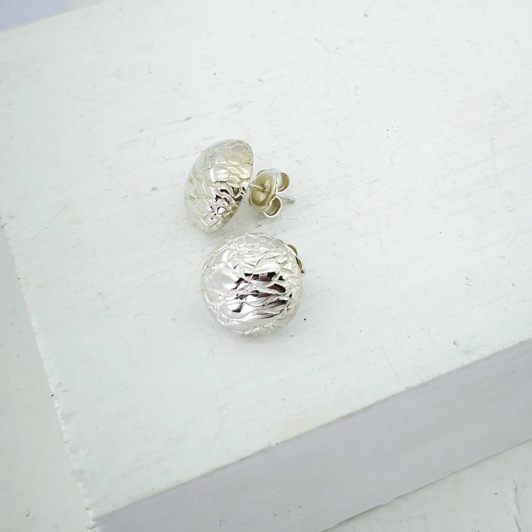 Tuatara Studs in solid sterling silver, handmade by The Wild Jewellery. These studs are inspired by the texture of the rare Tuatara, a reptile found only in NZ.