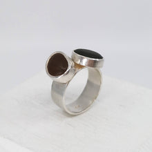 Load image into Gallery viewer, The Two-stone Beach Pebble Ring by Claire McSweeney is hand crafted NZ Jewellery, made using pebbles from Wellington&#39;s Seatoun Beach, and solid silver. 
