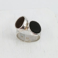 Load image into Gallery viewer, The Two-stone Beach Pebble Ring by Claire McSweeney is hand crafted NZ Jewellery, made using pebbles from Wellington&#39;s Seatoun Beach, and solid silver.
