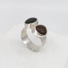 Load image into Gallery viewer, The Two-stone Beach Pebble Ring by Claire McSweeney is hand crafted NZ Jewellery, made using pebbles from Wellington&#39;s Seatoun Beach, and solid silver.
